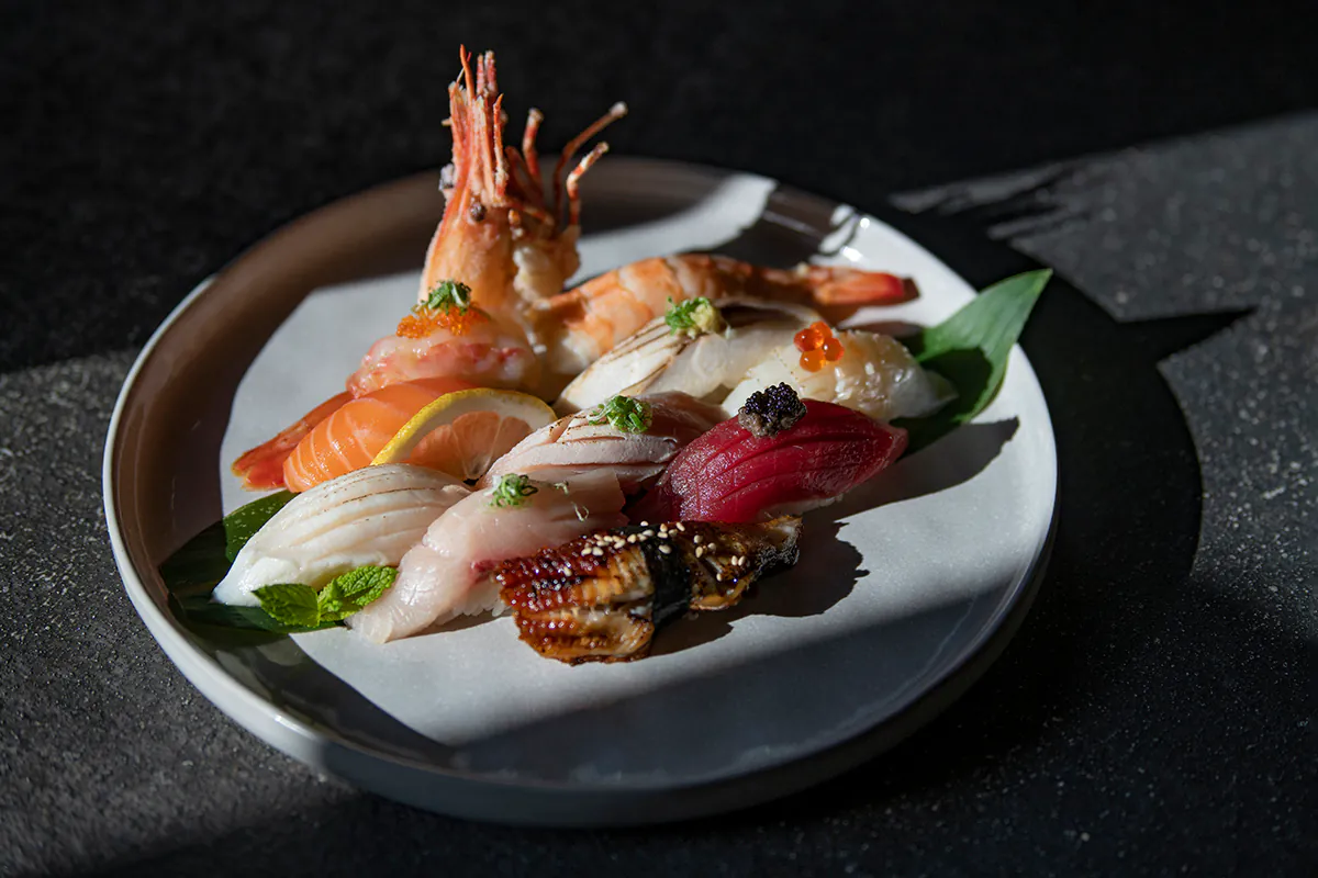 Sushi assortment including shrimp, salmon, tuna, and eel on a plate at Shiki Sushi，a Japanese Restaurant in Santa Rosa
